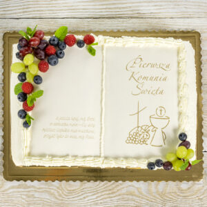 Tort komunijny książka dekorowany owocami