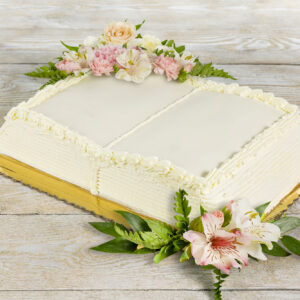 Tort książka z kwiatami na komunię Cukiernia Jacek Placek to synonim smaku domowych ciast z naturalnych produktów.