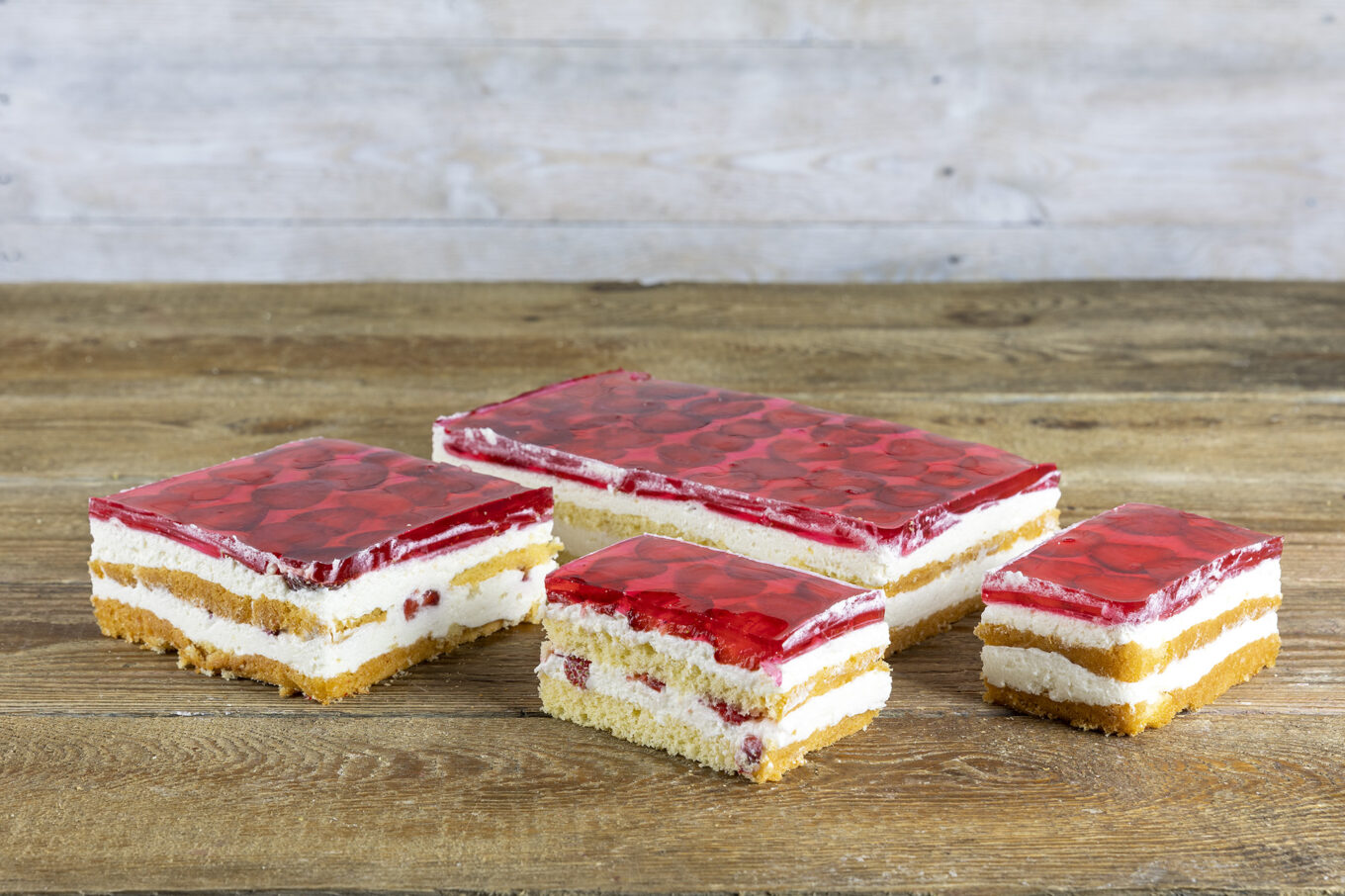 Sponge cake with cream, jelly and fresh strawberries. Jacek Placek confectionery is synonymous with the taste of homemade cakes made from natural products.
